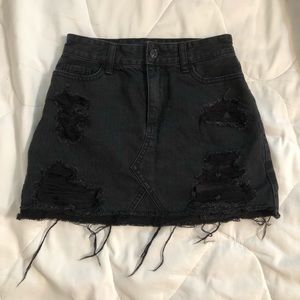 ripped black denim skirt